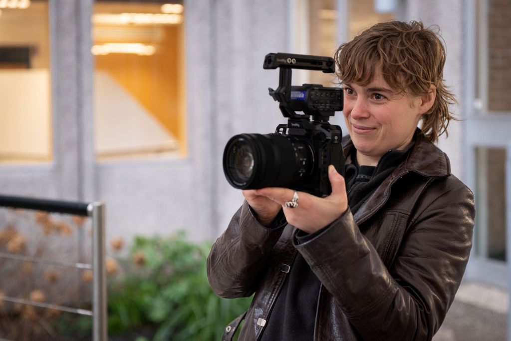Student of the MA in Visual Anthropology, Granada Centre for Visual Anthropology, University of Manchester, filming with a video camera